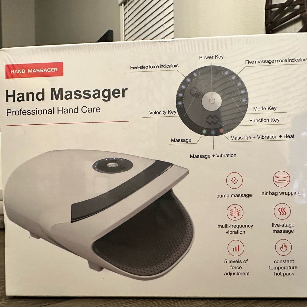 New Unopened Hand Massager with 5 modes including vibration and heat.